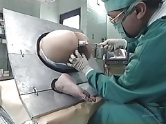 Take a look at what's going on here. A beautiful Nippon chick is the subject of an experiment and she can't do nothing except obey and allow the scientist to do his job. He inserts different liquids in her ass, filling her up. Why is she here and what's happening? Let's find out!